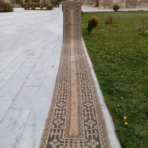 May include: A set of three ceramic mugs with a speckled, matte finish. The mugs are in shades of cream, light gray, and dark gray. Each mug has a simple, minimalist design and a rounded handle.