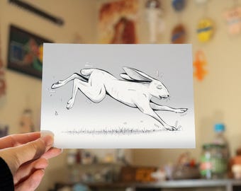 Impresión de liebre corriendo con fondo oscuro, 5"x7" o 8.5"x11", disponible en diferentes tipos de papel y acabados.