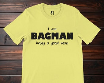 I am BAGMAN (Being a good Man) short sleeve shirt for men! A polite, kind, good, strong, brave, superhero. Will hold your bag while you shop