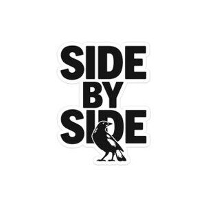 May include: A black and white sticker featuring the text "SIDE BY SIDE" arranged vertically. A black crow illustration is at the bottom. The sticker has a white border.