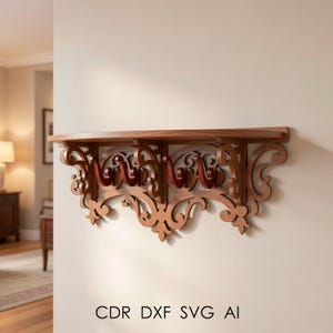 May include: A wooden wall shelf with ornate, carved detailing. The shelf has a curved front and is supported by decorative brackets with a reddish-brown hue. The text "CDR DXF SVG AI" is printed at the bottom of the image.
