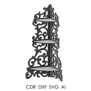 May include: Black corner shelf with three triangular shelves. The shelf has an ornate, swirling design. The text "CDR DXF SVG AI" is printed at the bottom. The shelves are ideal for displaying decorative items.