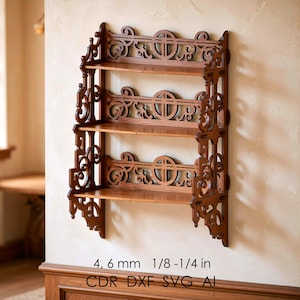 May include: A dark wood wall shelf with four shelves and ornate, carved detailing. The shelf is mounted on a beige wall and features decorative scrollwork and circular accents. The text at the bottom reads "4, 6 mm 1/8-1/4 in CDR DXF SVG AI."