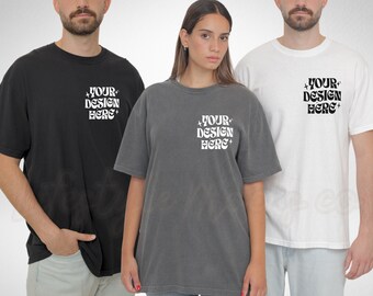 May include: Three t-shirts in black, gray, and white with the text "YOUR DESIGN HERE+" printed on the front.