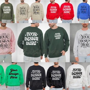 May include: A collection of 10 different color sweatshirts with the text "YOUR DESIGN HERE" printed on the front. The sweatshirts are all crew neck and long-sleeved.