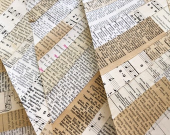 May include: A close-up of a collage constructed from strips of old book pages and musical scores. The paper pieces are arranged in a geometric design, revealing text and musical notation. The color scheme is mainly beige and off-white, producing a textured, layered appearance.