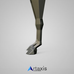 May include: Close-up of a metallic, geometrically shaped table leg with a pointed foot. The leg is a dark gray color and has a smooth, polished finish.