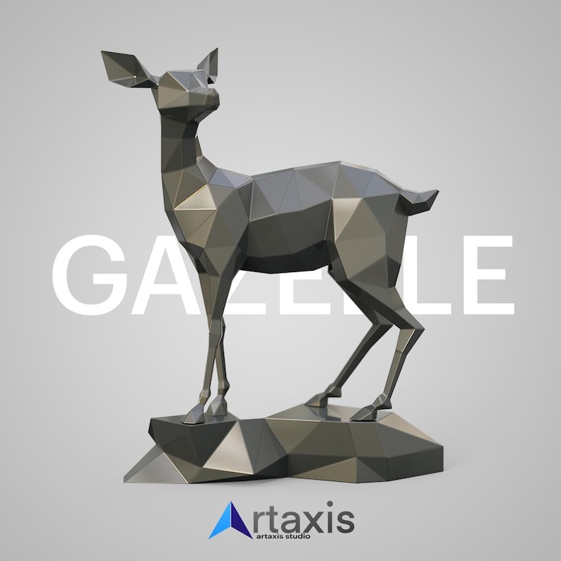 May include: A low-poly, silver-colored sculpture of a gazelle standing on a rocky base. The sculpture is made of many small triangles, giving it a geometric look. The word "GAZELE" is printed in white letters on the base.