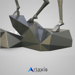 May include: A geometric, metallic sculpture with a faceted design. The sculpture features angular shapes and a reflective surface, with a light source creating highlights and shadows. The base is a series of interconnected geometric forms.