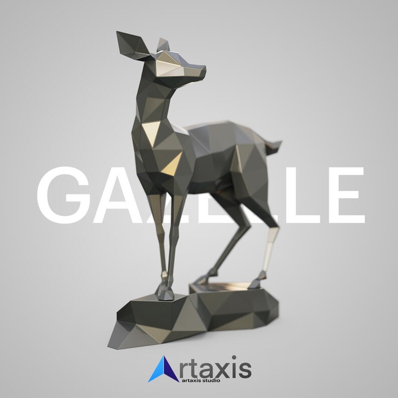 May include: A low-poly, silver-colored deer sculpture standing on a rocky base. The sculpture is made of triangles and has a geometric design. The deer is looking to the right. The word "GAZE" is visible in the background.