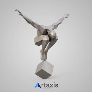 May include: A geometric, abstract sculpture of a person in a crouching pose with arms outstretched, standing on a cube. The sculpture is made of a light gray material.