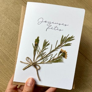 Carte Joyeuses Fêtes de fin d'année avec fleurs séchées