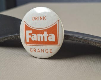 Bouton orange Fanta vintage, publicité soda