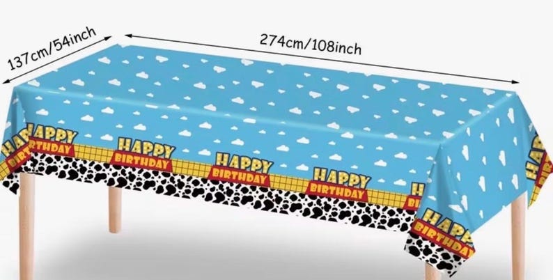 May include: Blue rectangular birthday party tablecloth, 274cm long and 137cm wide, with a sky and cloud pattern. Features a border with a cow print and the words "HAPPY BIRTHDAY".