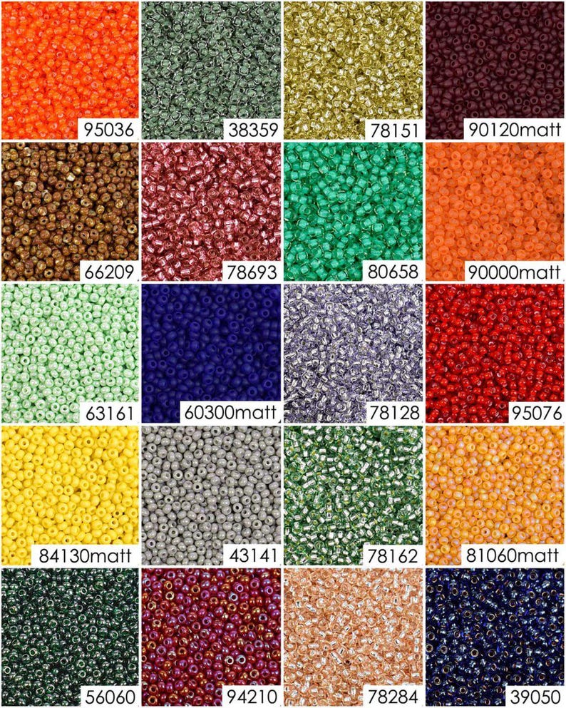 May include: Assortment of 16 small glass seed beads in various colors, including orange, green, gold, brown, red, blue, silver, and yellow. The beads are arranged in a grid pattern.