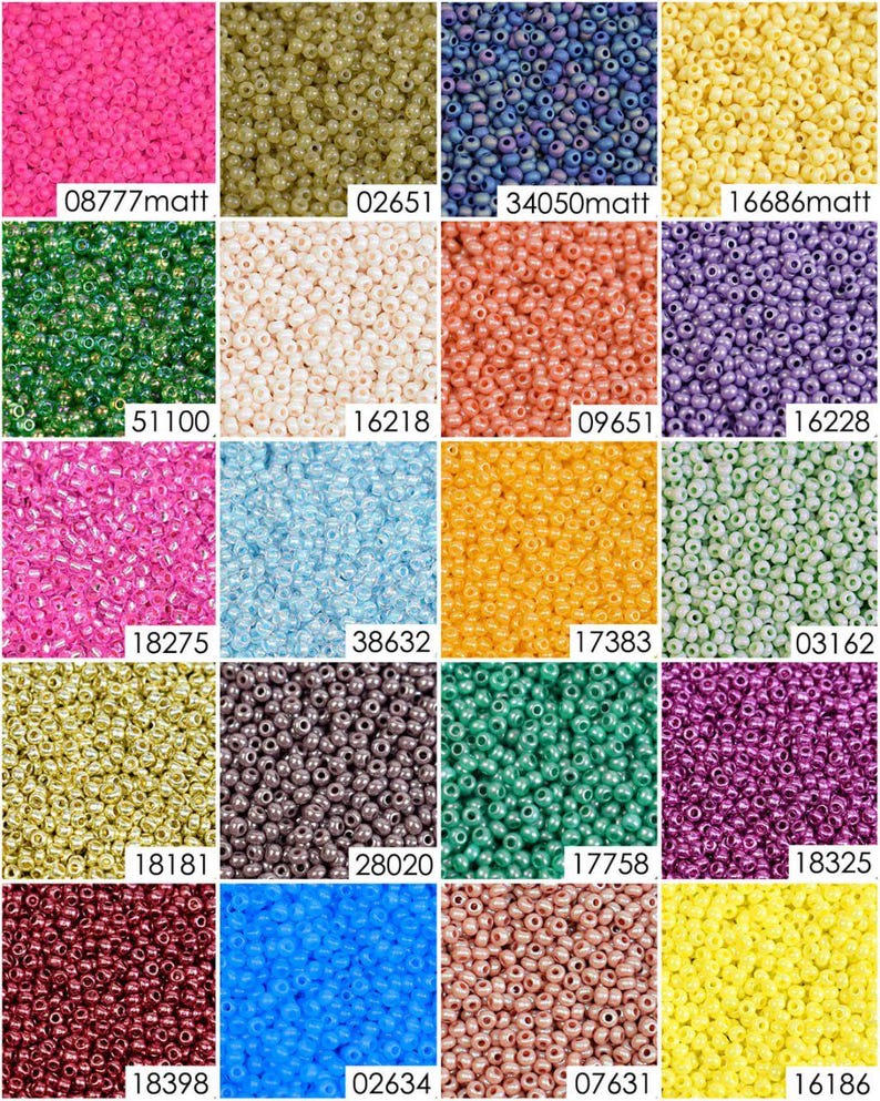 May include: Assortment of 20 different colors of seed beads. The beads are small and round, and they are arranged in a grid pattern. The colors include pink, green, white, orange, purple, blue, yellow, gold, brown, and red.