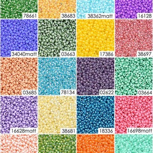 May include: Assortment of 12 colors of seed beads, each color displayed in a square. The beads are small and round, with a glossy finish. The colors include green, orange, yellow, blue, purple, pink, and peach.