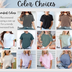 K&ouml;nnte beinhalten: Eine Tabelle, die verschiedene Farben von T-Shirts mit dem Text "Comfort Colors" und "Color Choices" zeigt. Die Tabelle zeigt 10 verschiedene Farben von T-Shirts, darunter Wei&szlig;, Schwarz, Espresso, Moos, Bucht, Blautanne, Elfenbein, Orchidee, Bl&uuml;te und Jeansblau.