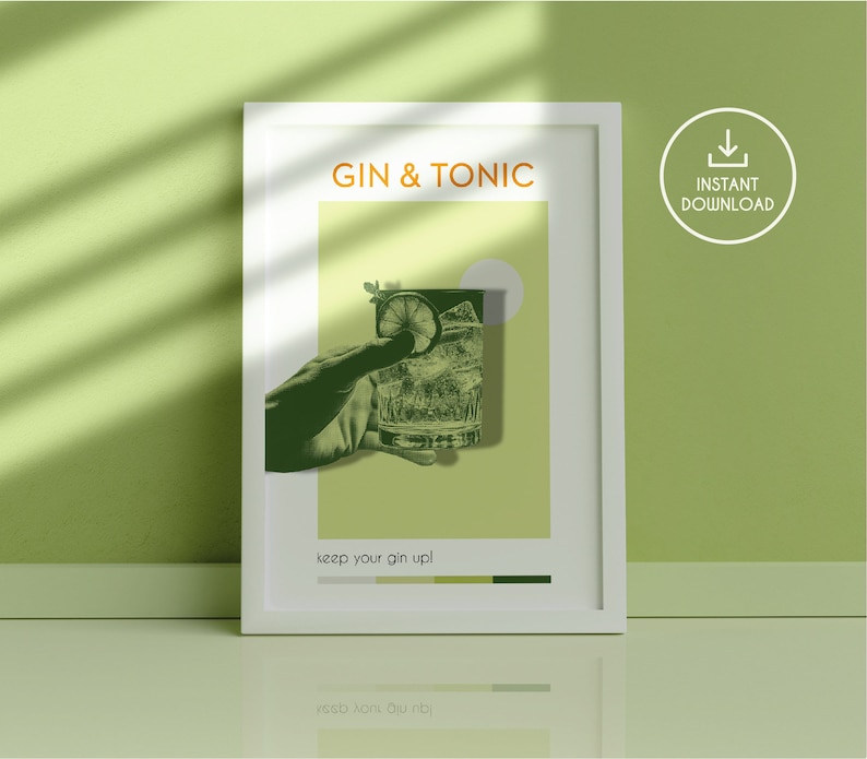 A green color Gin Tonic downloadable poster, carrying a vintage vibe, with an image of a hand holding a cocktail glass, stands leaning against the compatible color Wall in a room with smooth flat ground.