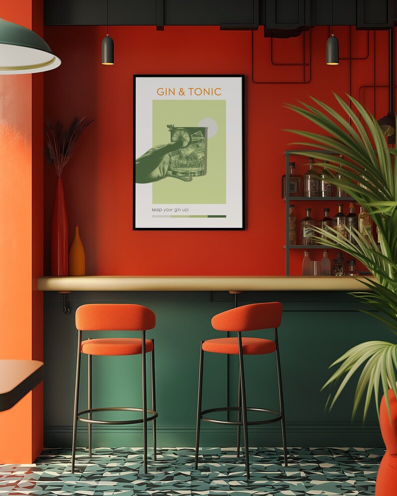 Hanging on the wall of a vibrant orange bar, there is a green color poster with a hand holding a photo-effect Gin Tonic cocktail. There is a shelf with alcohol bottles on the right side of the bar and two green bar chairs in front of it