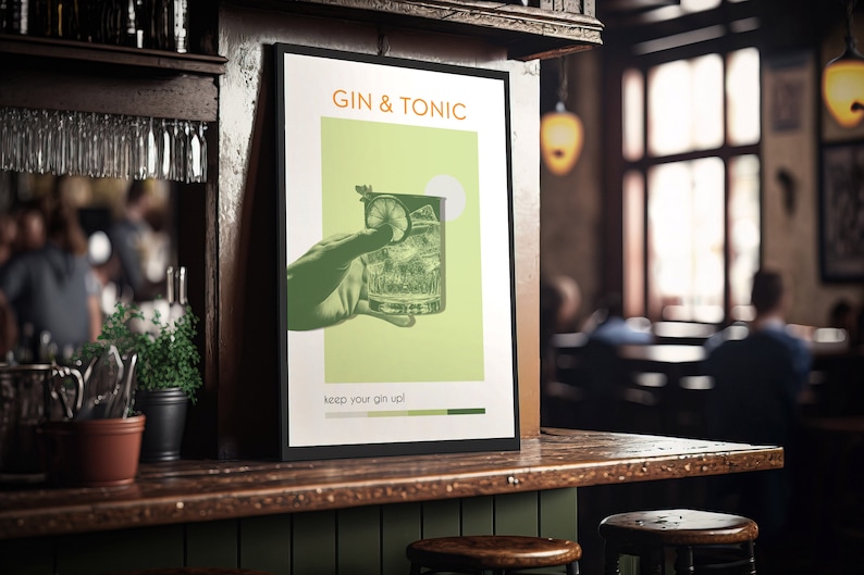 A green color Gin Tonic poster, carrying a vintage vibe, with an image of a hand holding a cocktail glass, stands leaning against the bar of a pub, cocktail glasses are hung next to it and the bar has a wooden texture.