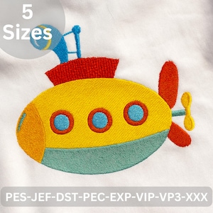 May include: Embroidered yellow submarine design with red, blue, and green accents. The design includes the text "5 Sizes" in a circle at the top. The bottom of the image includes the text "PES-JEF-DST-PEC-EXP-VIP-VP3-XXX".