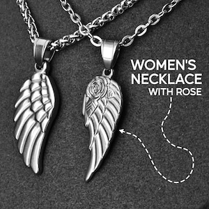 May include: Two silver-colored necklaces with wing-shaped pendants. One pendant features a rose design, while the other has a plain wing. The necklaces are on a dark gray background. The text "WOMEN'S NECKLACE WITH ROSE" is visible.