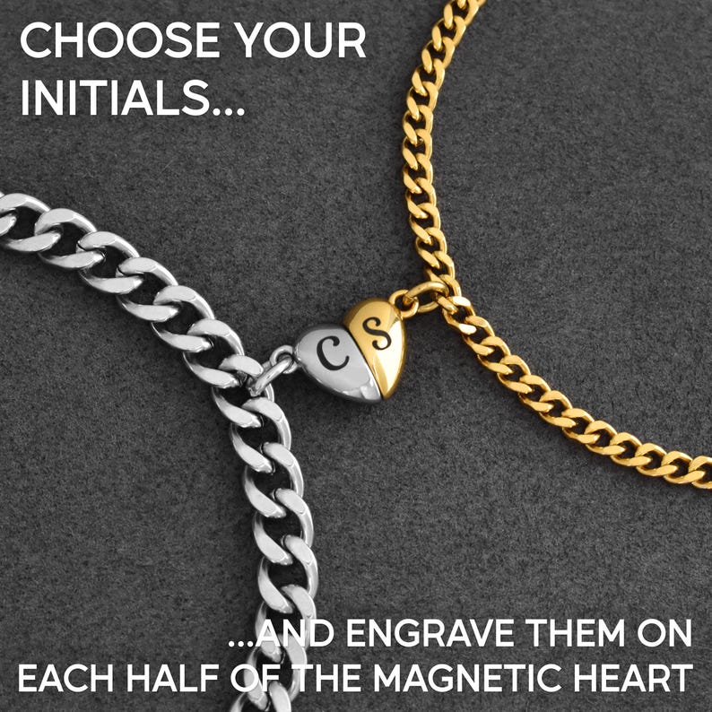 May include: Two curb chain bracelets, one silver-toned and one gold-toned, connected by a magnetic heart charm. The heart is split into two halves, each engraved with a single letter, C and S. Text reads: CHOOSE YOUR INITIALS... AND ENGRAVE THEM ON EACH HALF OF THE MAGNETIC HEART.