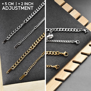 May include: Silver and gold-toned metal curb chain bracelets featuring lobster claw clasps and heart-shaped charms. The chains include an extension piece for a + 5 CM | + 2 INCH adjustment, allowing for a customizable fit for these link-style bracelets.
