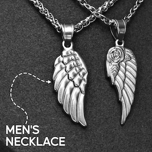May include: Two silver-toned wing pendant necklaces on a chain. One wing has a rose design. The text "MEN'S NECKLACE" is in white at the bottom left. The background is a dark gray.