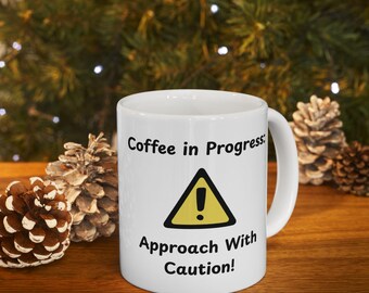 Fun Silly Humor "Coffee in Progress, Approach With Caution" Mug.Great gag gift for friend, coworker or loved one. Ideal for caffeine addicts