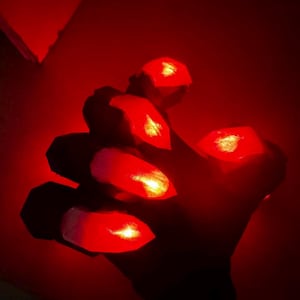 Self-design luminous cyberpunk claws, glowing mechanical claws, cyberpunk cosplay costume,technology fursuit dragon claws, Halloween costume