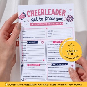 May include: A white paper form titled Cheerleader Get To Know You with pink and navy blue text and graphics including a megaphone and pom-poms. The form features sections for personal details, favorites, about me, and ways to support me.