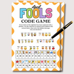 May include: A colorful April Fools Code Game with a pen. The game features the text "April Fools Code Game" in bright colors. The game includes a code to decipher a hidden message using symbols and letters.