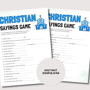 May include: Two printable Christian Sayings Game sheets. The title "Christian Sayings Game" is in blue, with a church icon. The game includes fill-in-the-blank phrases. A sticker with "Instant Download" is in the foreground.