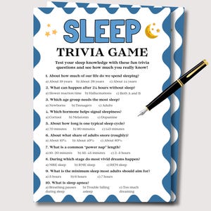 May include: A trivia game card titled "SLEEP TRIVIA GAME" with blue and white wavy borders. The card features sleep-related trivia questions and answers, with a black and gold pen resting on the right side.