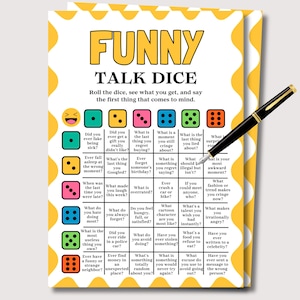 May include: A game card titled "FUNNY TALK DICE" with a yellow and white design. The card features dice icons and prompts for conversation starters. A black pen with gold accents rests on the card, ready for use.