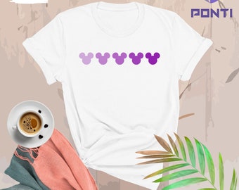 May include: White t-shirt with a row of five purple ombre Mickey Mouse heads.