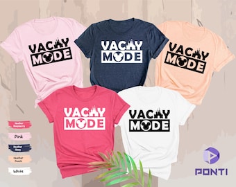 May include: Four t-shirts with the text "VACAY MODE" and a Mickey Mouse head graphic. The shirts are in pink, navy blue, white, and red.