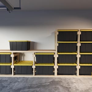 May include: A wooden storage shelf unit with multiple black storage bins with yellow lids. The shelf unit is in a garage setting.