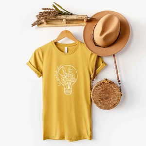 Let Your Light Shine Light Bulb | Short Sleeve Crew Neck | Women&#39;s Graphic Tee