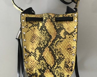 Very beautiful python pattern leather bag. New never worn. Radji model. Height 24 and width 15. Sold with card and dustbag.