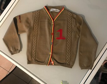 Very beautiful Dior cardigan from the Rasta collection. Excellent condition. Size 4 years. In merino wool.