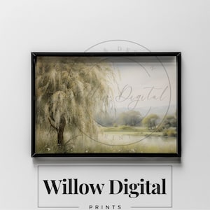 May include: A framed watercolor painting of a weeping willow tree with a pond and a grassy field in the background. The painting is in a black frame and has a soft, muted color palette.