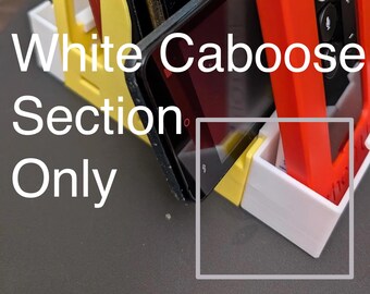 Caboose 32mm extends the Chooch MultiPhone holder by clipping to front or rear.  It's opening measures 32mm(-1.5mm at tab) x 78mm.