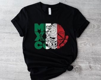 May include: Black t-shirt with a green, white, and red graphic of the Mexican flag and the word "MEXICO" in white letters.