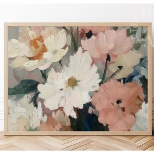 May include: An art print depicting a floral arrangement in soft hues of white, peach, and pink, set against a grey backdrop. The artwork is presented in a light wooden frame, enhancing the aesthetic appeal of the floral painting.