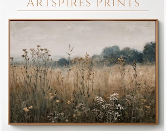 Könnte beinhalten: Ein gerahmter Landschaftsdruck mit einem Feld aus hohen, getrockneten Gräsern und Wildblumen in Braun-, Gelb- und Weißtönen. Das Kunstwerk hat eine gedämpfte Farbpalette mit einem weichen, dunstigen Himmel und einer Baumreihe im Hintergrund. Der Text "ARTSPIRES PRINTS" steht darüber.