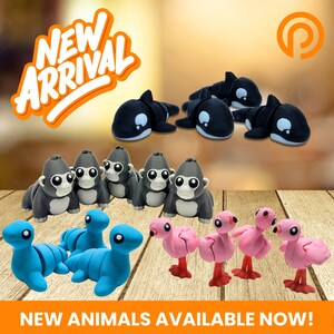 May include: A collection of small 3D printed animal figurines including black and white orcas, gray gorillas, blue long-necked creatures, and pink flamingos. The text NEW ARRIVAL appears in the top left corner and NEW ANIMALS AVAILABLE NOW at the bottom.