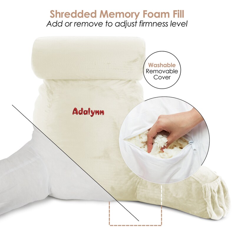 May include: A white, plush, wedge-shaped pillow with a removable cover. The pillow is filled with shredded memory foam that can be adjusted to change the firmness level. The pillow has the word "Adalynn" embroidered on it.